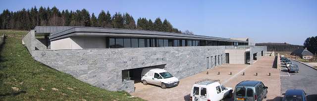 The <i>Centre archéologique européen du Mont Beuvray</i> in Glux-en-Glenne. A modern building with offices, labratories (one for us!), workshops, a scientific library and an archaeological storage area build in the hill. Local granite is used in the facade of the building.